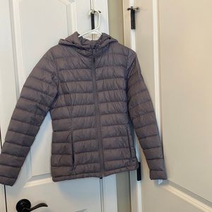 Gently used McKinly light weight Women’s  puffer jacket in a mauve color